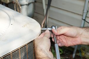 Replacing air conditioning condenser fan assembly and fastening screws