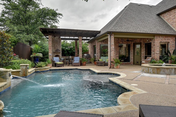 Hardscaped backyard with pool
